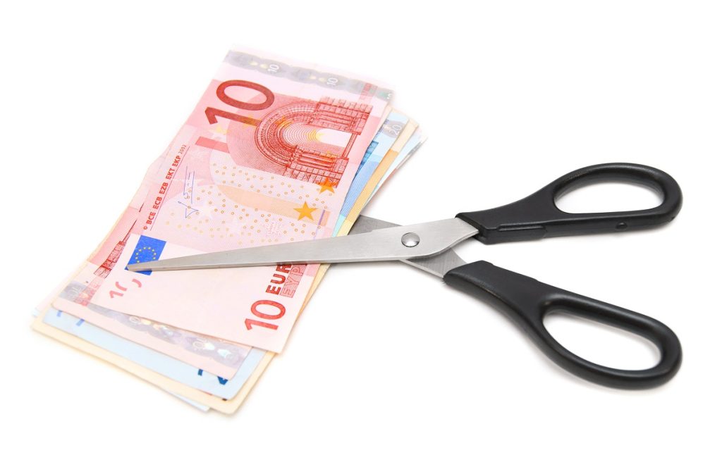 scissor and banknote euro